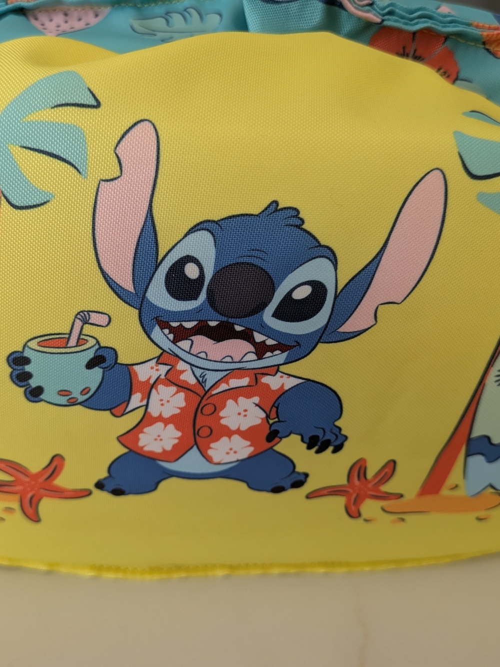 Disney Yellow Kids Swim Vest with Blue Stitch Graphic
